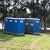 columns of portable toilets set up at sports event