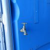 Construction site toilet with water tap